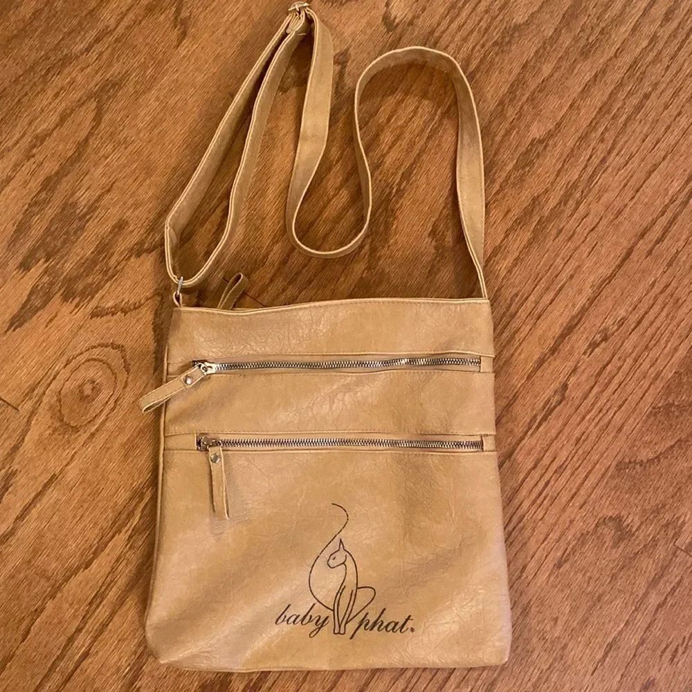 Baby Phat bag tan colored black writing on it cross body or shoulder